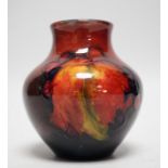 A Moorcroft flambé leaf and berry vase, 8cm