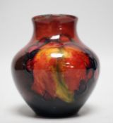 A Moorcroft flambé leaf and berry vase, 8cm