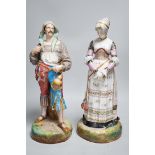 A pair of large Paris porcelain figures of a gentleman and a lady, lady 41cms high