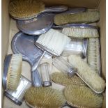 A quantity of assorted silver mounted hand mirrors, brushes and toilet jars, various dates and