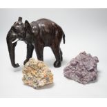 Two specimens; amethyst and rock crystal, and a leather model of an Indian elephant, 24cm high