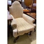 A George I style upholstered armchair, width 84cm, depth 78cm, height 112cm
