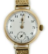 A lady's 1920's 9ct gold Omega manual wind wrist watch, on a later 9ct gold strap, overall 18.5cm,