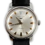 A gentleman's steel and enamel Longines Conquest Automatic wrist watch, with date aperture, case