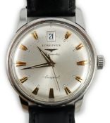 A gentleman's steel and enamel Longines Conquest Automatic wrist watch, with date aperture, case