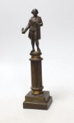 A late Victorian bronze figure of Shakespeare standing upon a column, 20cms high