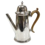 A late Victorian silver bachelor's coffee pot, by Charles Stuart Harris, London, 1896, height 18.