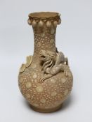 A Chinese enamelled biscuit porcelain 'chilong' vase, 21cm
