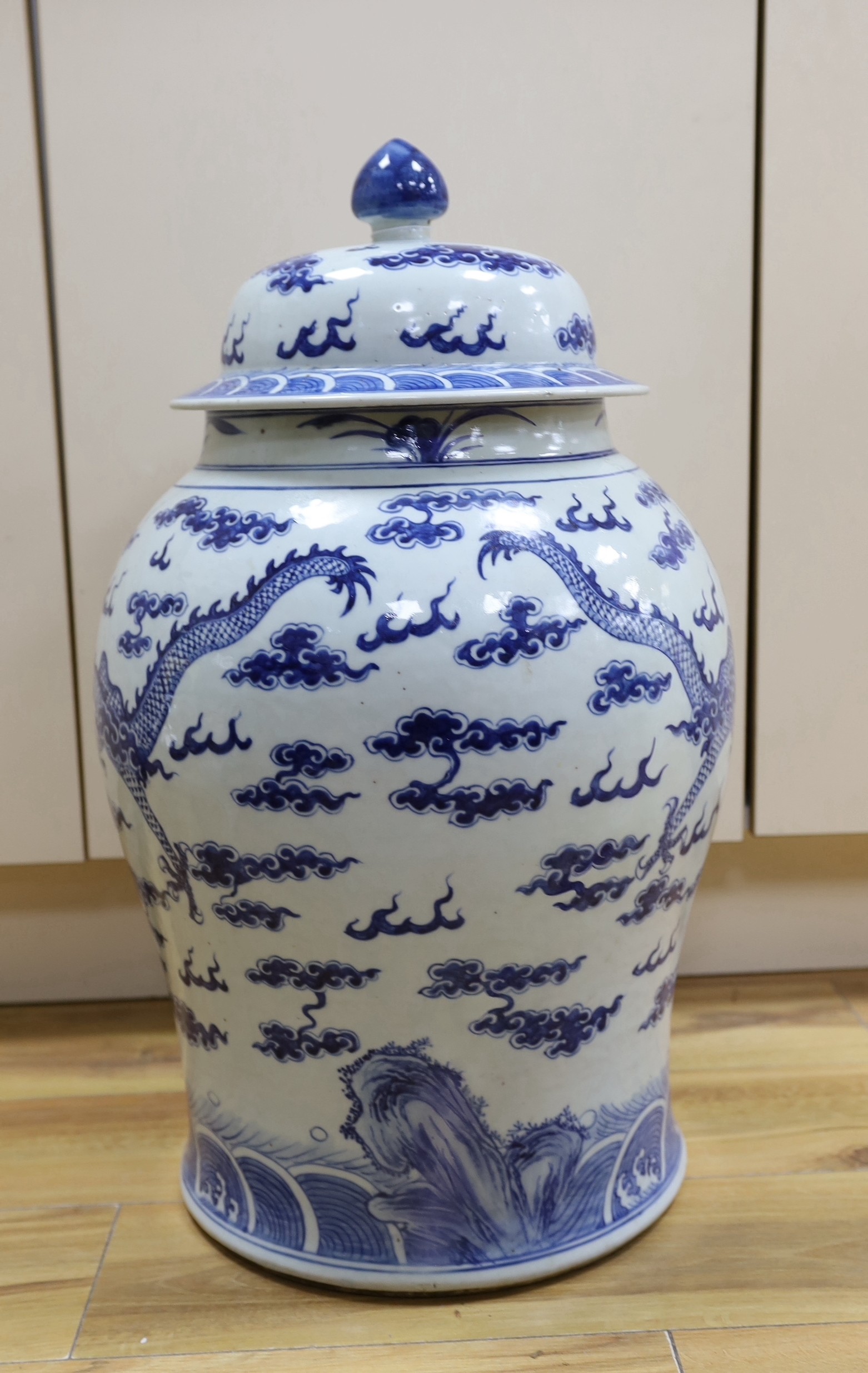 A 19th century Chinese large blue and white 'dragon' jar and cover, 63cms high - Image 2 of 4