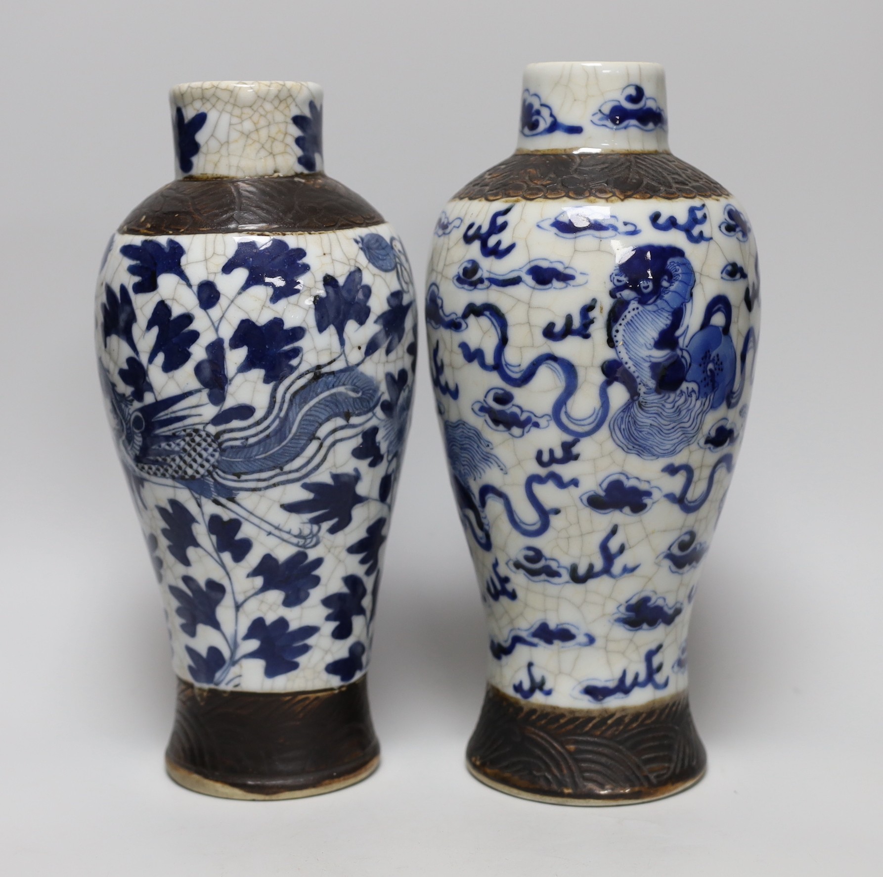 A pair of 19th century Chinese crackleglaze blue and white vases, 27cm - Image 2 of 4