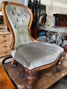 A pair of Victorian mahogany spoon back nursing chairs, width 57cm, depth 57cm, height 91cm