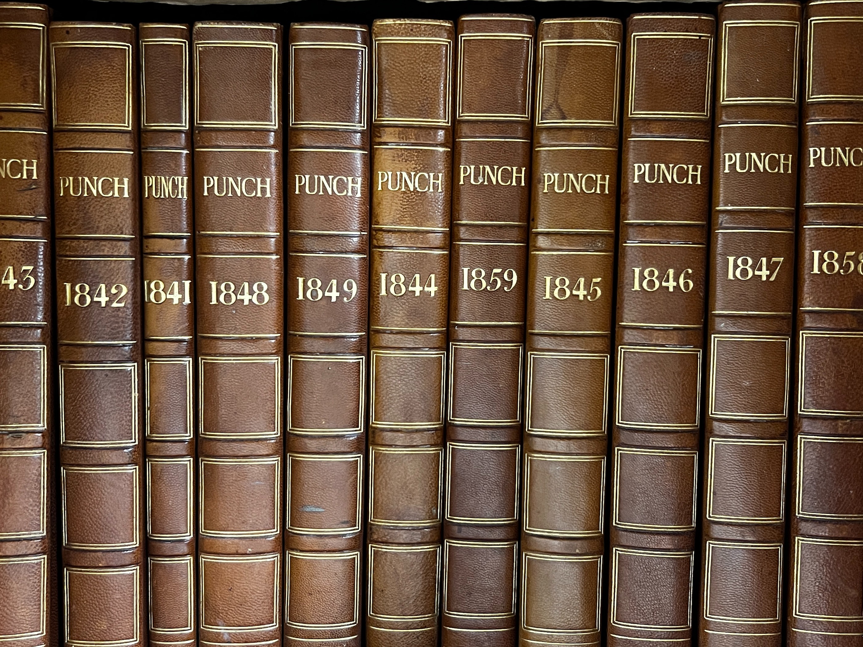 Punch Magazine, 100 years from 1841, large quantity of bound 19th and 20th century editions,