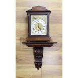 A Edwardian inlaid mahogany bracket clock, with traditional dial and chiming mechanism, clock