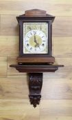 A Edwardian inlaid mahogany bracket clock, with traditional dial and chiming mechanism, clock