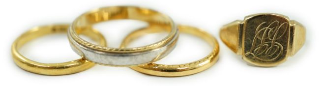 Two 22ct gold wedding bands, 5.2 grams, a 9ct gold signet ring, 2.4 grams and a two colour 750