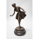 A bronze figure of a ballerina, signed, 40cm tall