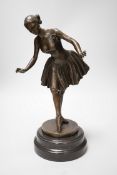 A bronze figure of a ballerina, signed, 40cm tall