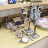 Assorted plated wares including a pair of three light candelabra, 52cms high