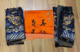 Two early 20th century Chinese silk embroidered “dragon" panels, possibly cut from an altar cloth or