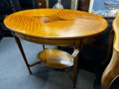 An Edwardian satinwood banded oval satinwood two tier centre table, width 98cm, depth 60cm, height