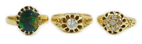An early 20th century 18ct gold and diamond cluster ring, size P/Q, gross weight 3.1 grams and two