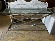 A contemporary rectangular glass top console table on X shaped frame, width 150cm, depth 40cm,
