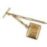 An Edwardian engraved 9ct gold vesta case, 44mm, gross 20.6 grams, together with an 18ct gold