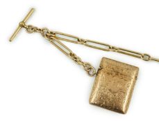 An Edwardian engraved 9ct gold vesta case, 44mm, gross 20.6 grams, together with an 18ct gold