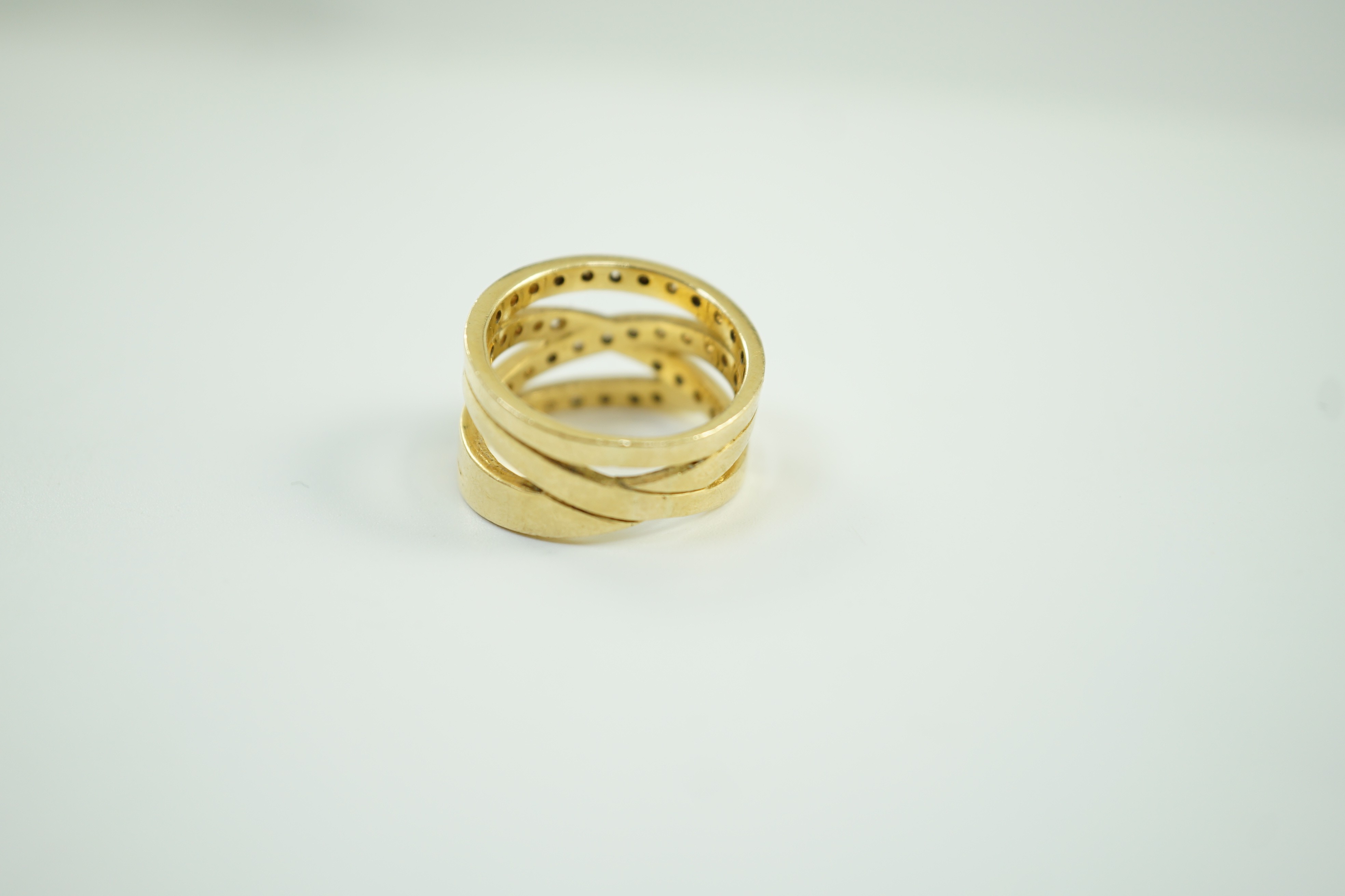 A modern 750 and diamond chip cluster set multi shank dress ring, size P, gross 10.1 grams. - Image 5 of 6
