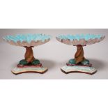 A pair of late 19th century Royal Worcester majolica dolphin comports, 10cm tall