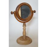 A Victorian turned wooden shaving mirror, 37cms high