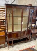 An Edwardian mahogany bow front display cabinet, width 126cm, depth 44cm, height 187cm