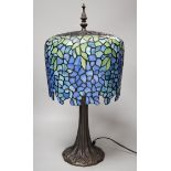 A Tiffany style stained glass lamp. 54cm tall