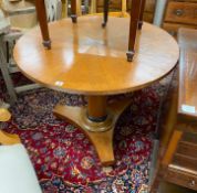 A Biedermeier style circular breakfast table, diameter 91cm, height 75cm and a pair of elbow chairs