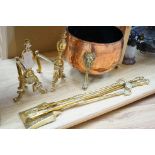 A set of three Victorian brass fire irons, a pair of fire dogs and a copper log bin