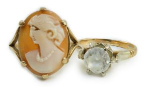 A 750 yellow metal and white zircon ring, gross 4 grams and a yellow metal and cameo shell ring,