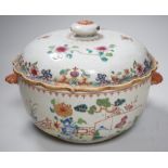 A Chinese famille rose ‘garden’ tureen and cover, Qianlong period, 19cms high