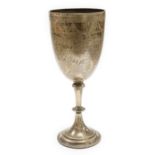 A late Victorian engraved silver presentation goblet, possible Charles Boyton, London, 1890, 23cm,