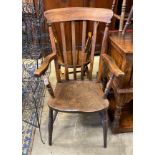 A Victorian elm and beech Windsor lathe back armchair, width 59cm, depth 46cm, height 108cm