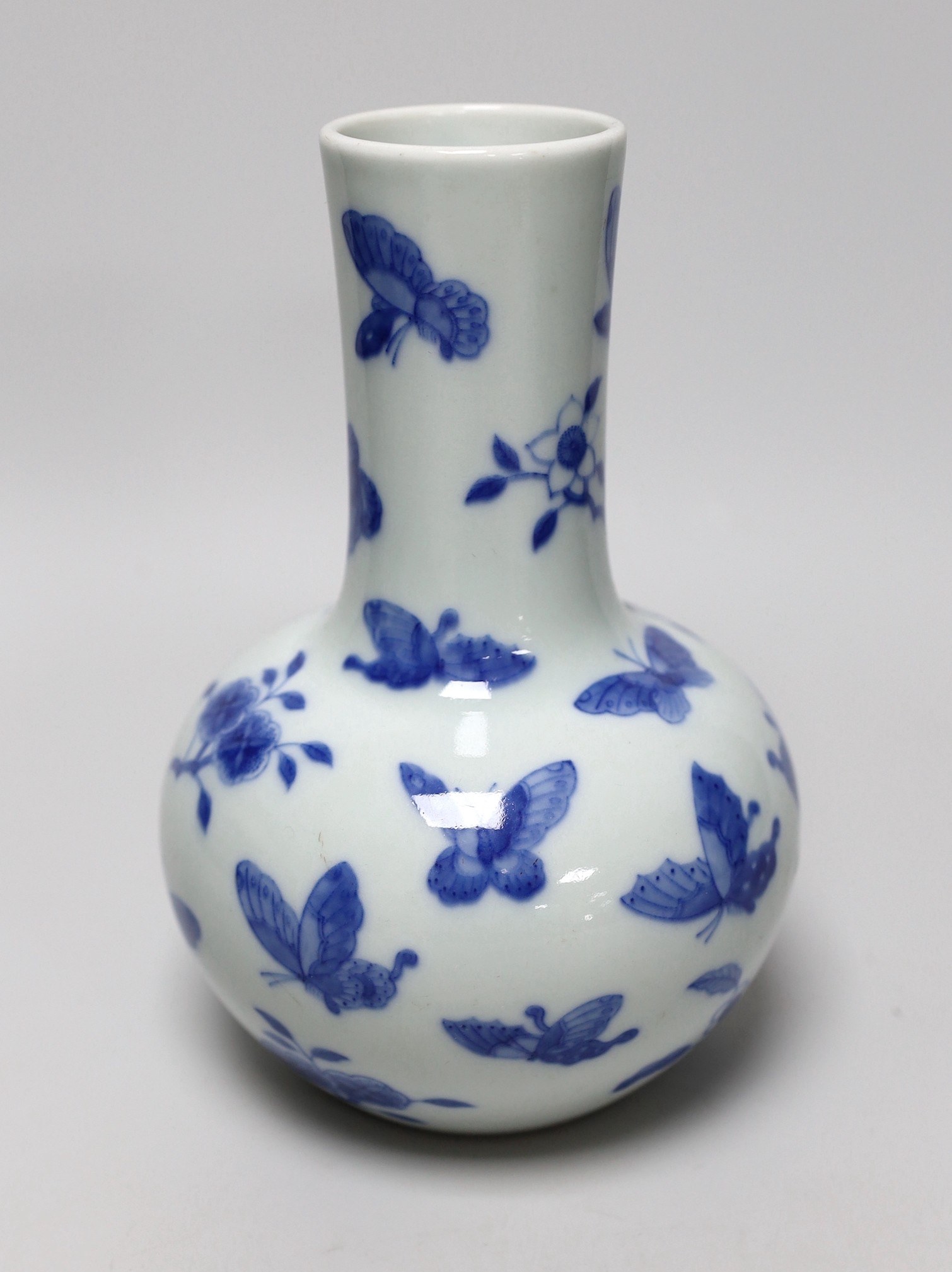 A Chinese blue and white ‘butterfly’ vase, 19cm