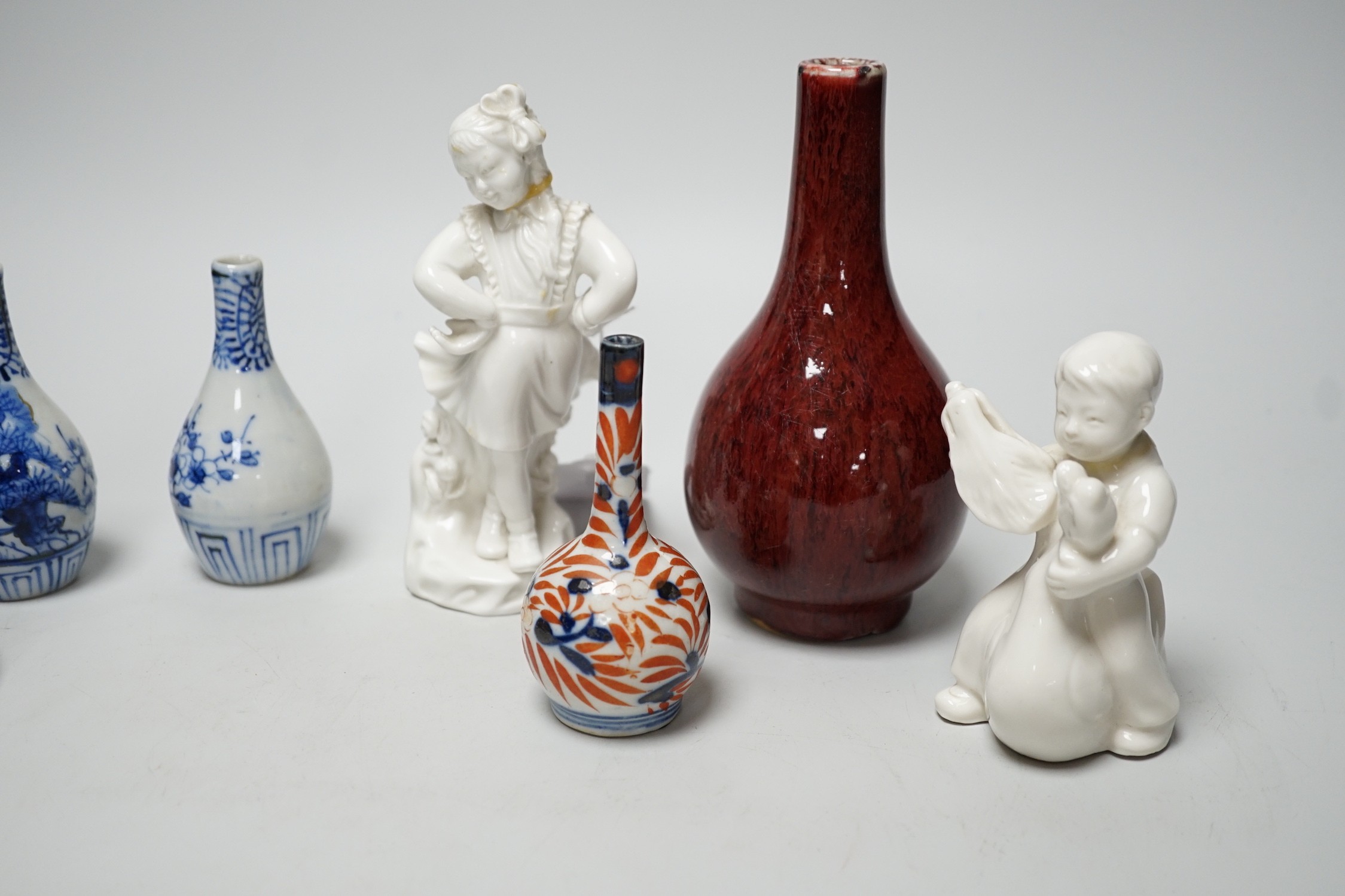 A Chinese sang de boeuf bottle neck vase, together with four Chinese miniature vases, three - Image 8 of 19