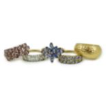 Four assorted modern 9ct gold and gem set rings and an Italian 375 ring, gross weight 14.4 grams.