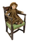 An Ed Tasson bisque doll, French, circa 1928, impressed Toto Déposé Ed Tasson Al & Cie Limoges, with