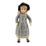 A Pintel and Godchaux bisque fashion doll, French, circa 1890, impressed B P9G, closed mouth and