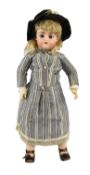 A Pintel and Godchaux bisque fashion doll, French, circa 1890, impressed B P9G, closed mouth and