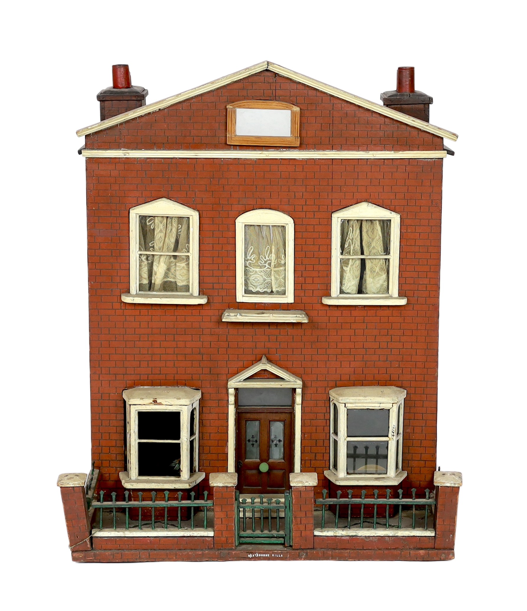 A back-opening furnished English dolls’ house, late 19th century, modelled as a double-fronted