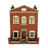 A back-opening furnished English dolls’ house, late 19th century, modelled as a double-fronted