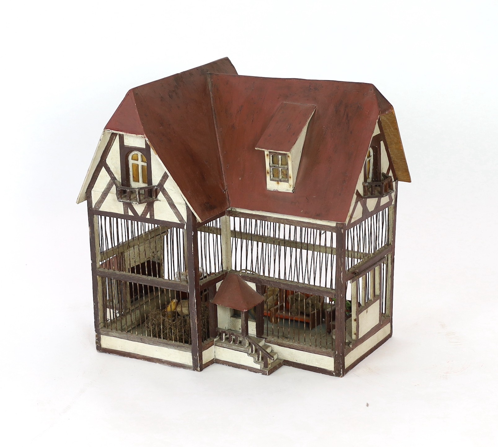 A German ‘birdcage’ dolls’ house, late 19th century, modelled as half-timbered house with red roof - Image 3 of 6