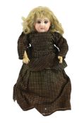 A Tete Jumeau bisque doll, French, circa 1885, stamped in red DEPOSE DEP JUMEAU BTE SGDG 3, with red