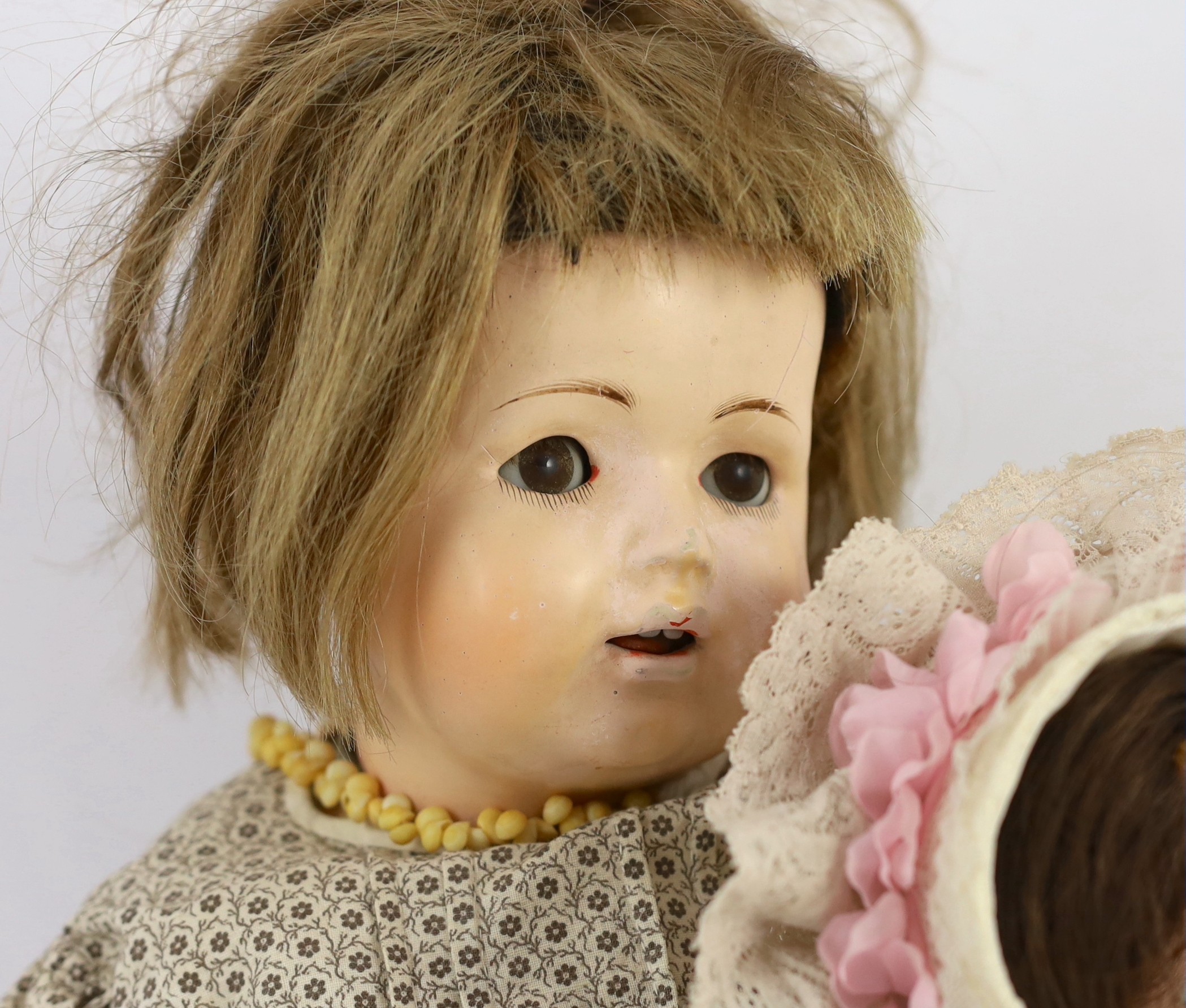 An unusual composition headed doll, German, circa 1900, indistinctly impressed 46, with open - Image 2 of 4